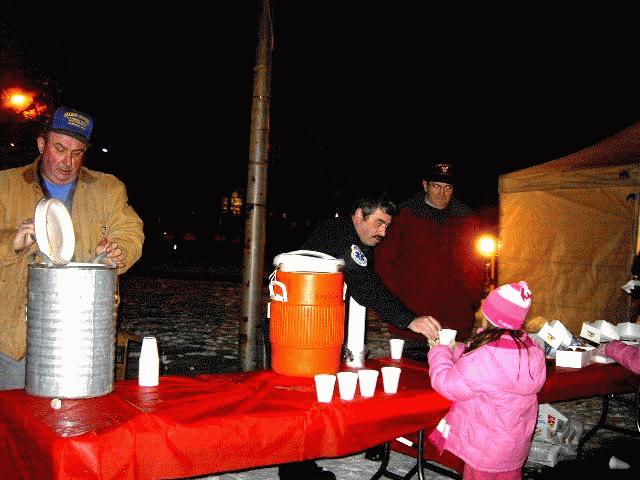 Dover Firemen serving hot chocolate